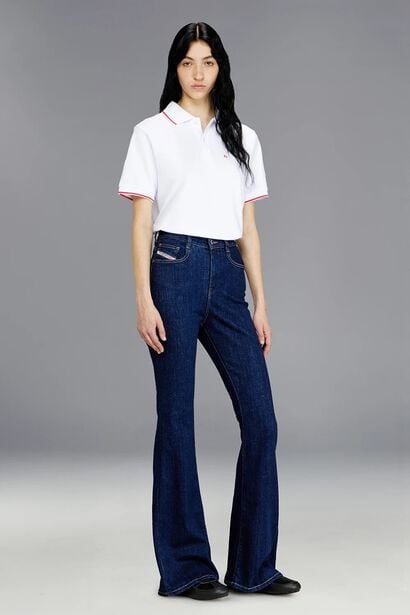 Model wearing the D-Partt bootcut fit jeans. Diesel&rsquo;s take on the all-American classic Bootcut. The high-waisted fit has an extra-long, slim leg with an ample flare to create an ultra-elongated silhouette.